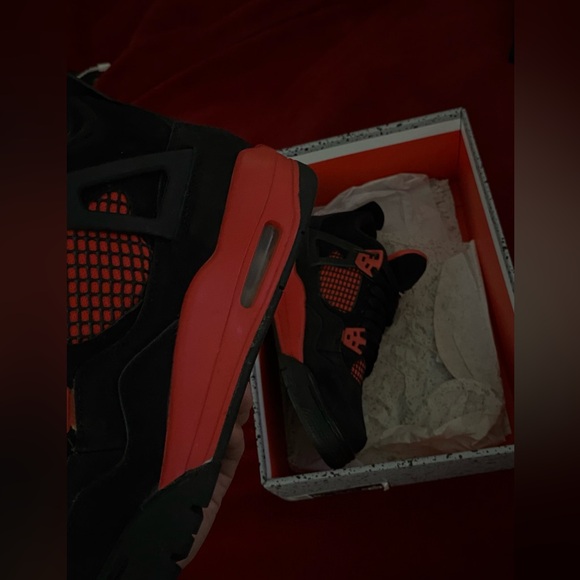 Jordan 4 Red Thunders.